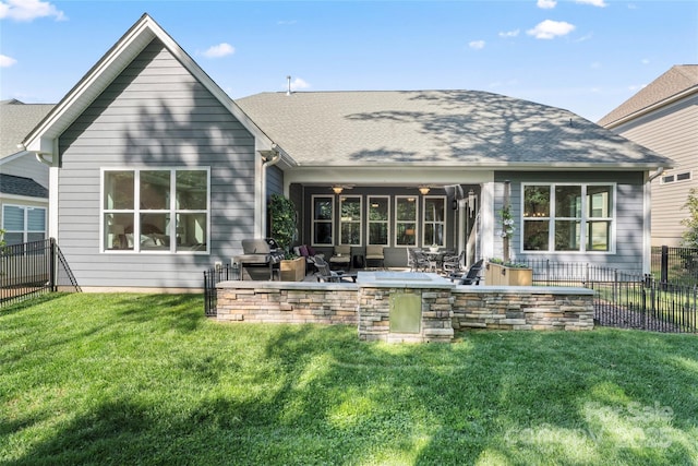 4012 Brandywine Ter, Lancaster, SC 29720 - rear view of house featuring an outdoor hangout area, a yard, a fenced backyard, and a patio area