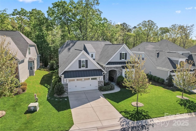 4012 Brandywine Ter, Lancaster, SC 29720 - view of front of house with driveway, stone siding, a standing seam roof, a front yard, and a garage