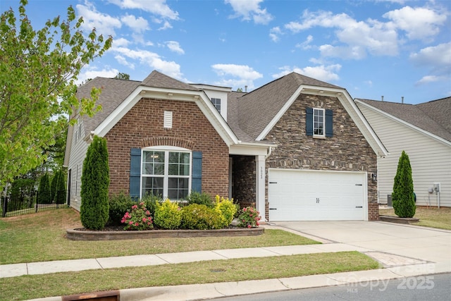 3028 Quinebaug Rd, Fort Mill, SC 29715 - view of front of property featuring a garage, a front yard, a shingled roof, and driveway
