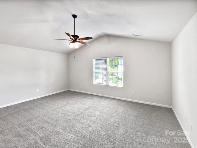 805 Gunnar Dr, Gastonia, NC 28054 - spare room featuring baseboards, vaulted ceiling, a ceiling fan, carpet floors, and visible vents