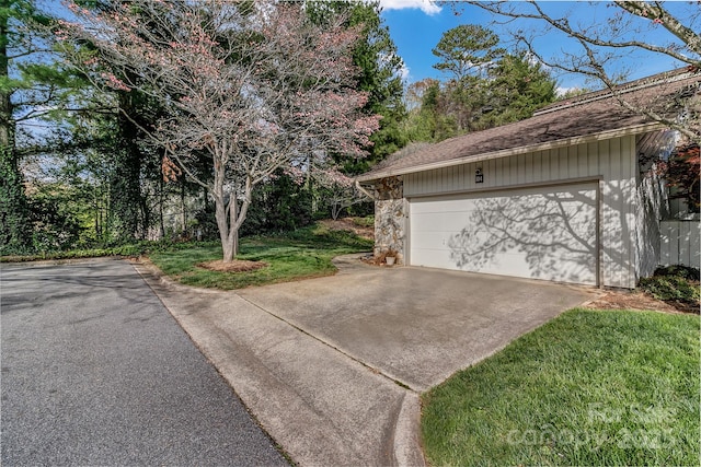 104 Parkway Ct Unit 1, Asheville, NC 28803 - exterior space featuring a yard, stone siding, and driveway