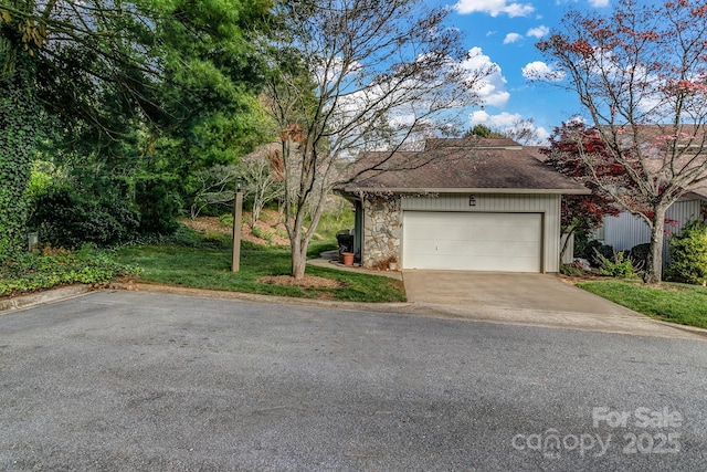 104 Parkway Ct Unit 1, Asheville, NC 28803 - single story home with concrete driveway, a front yard, roof with shingles, and a garage