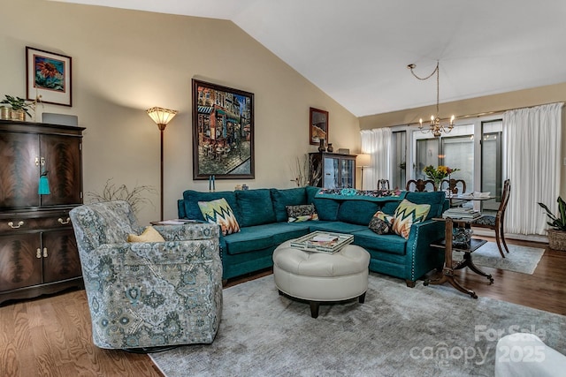 104 Parkway Ct Unit 1, Asheville, NC 28803 - living room featuring a chandelier, wood finished floors, and lofted ceiling