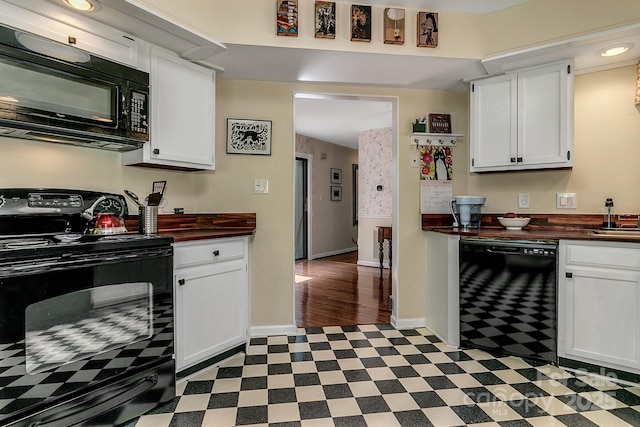 104 Parkway Ct Unit 1, Asheville, NC 28803 - kitchen with tile patterned floors, wooden counters, white cabinetry, and black appliances