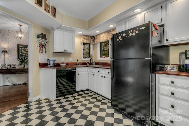 104 Parkway Ct Unit 1, Asheville, NC 28803 - kitchen featuring wallpapered walls, recessed lighting, white cabinetry, light floors, and black appliances