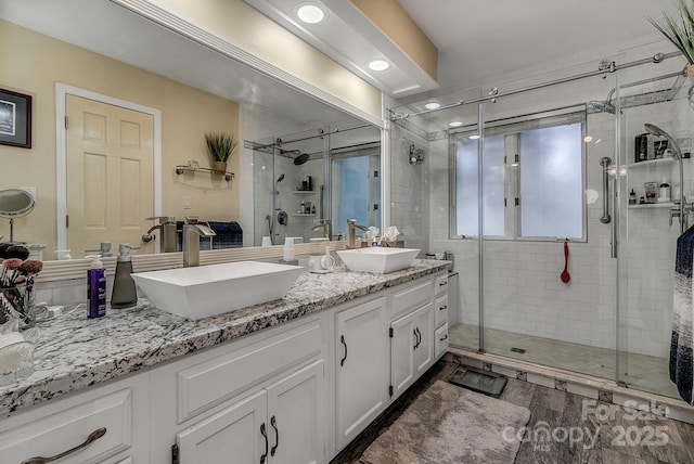 104 Parkway Ct Unit 1, Asheville, NC 28803 - full bath featuring a sink, double vanity, and a stall shower