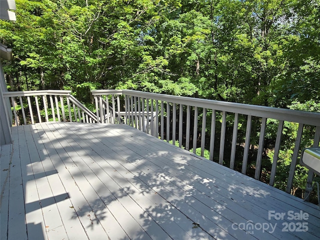 124 Cardinal Rd, Lake Lure, NC 28746 - deck featuring a forest view