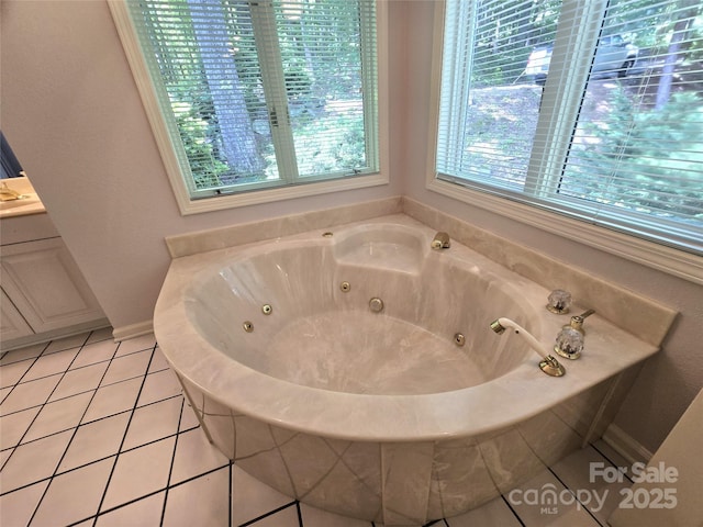 124 Cardinal Rd, Lake Lure, NC 28746 - bathroom featuring a tub with jets, tile patterned floors, and vanity