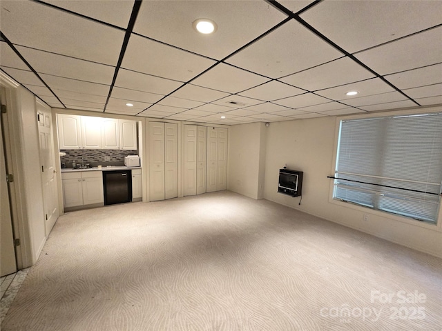 124 Cardinal Rd, Lake Lure, NC 28746 - unfurnished living room featuring light carpet, heating unit, a paneled ceiling, and recessed lighting