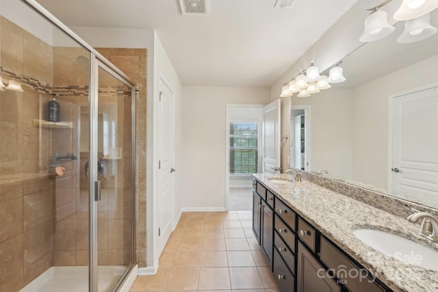5037 Nighthawk Dr, Fort Mill, SC 29707 - bathroom with a stall shower, tile patterned flooring, double vanity, baseboards, and a chandelier