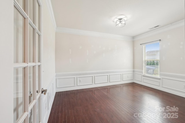 5037 Nighthawk Dr, Fort Mill, SC 29707 - unfurnished room with ornamental molding, dark wood-type flooring, a wainscoted wall, and a decorative wall