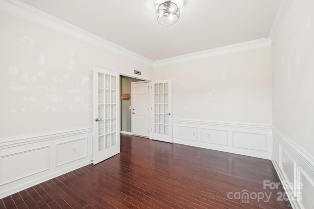 5037 Nighthawk Dr, Fort Mill, SC 29707 - unfurnished room with french doors, ornamental molding, a decorative wall, wainscoting, and wood finished floors