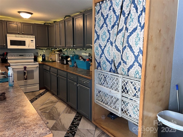 541 Pilgrim Rd, Ellenboro, NC 28040 - kitchen with white appliances and marble finish floor