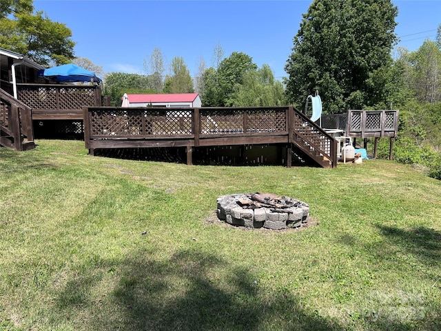 541 Pilgrim Rd, Ellenboro, NC 28040 - view of yard featuring an outdoor fire pit, a deck, and stairs