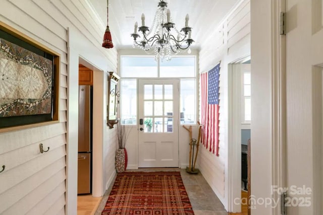 88 S Main St, Weaverville, NC 28787 - entryway featuring built in shelves and an inviting chandelier