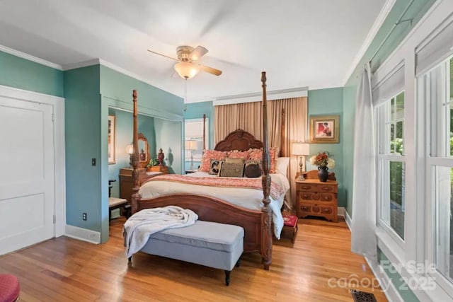 88 S Main St, Weaverville, NC 28787 - bedroom featuring light wood finished floors, baseboards, ornamental molding, and visible vents