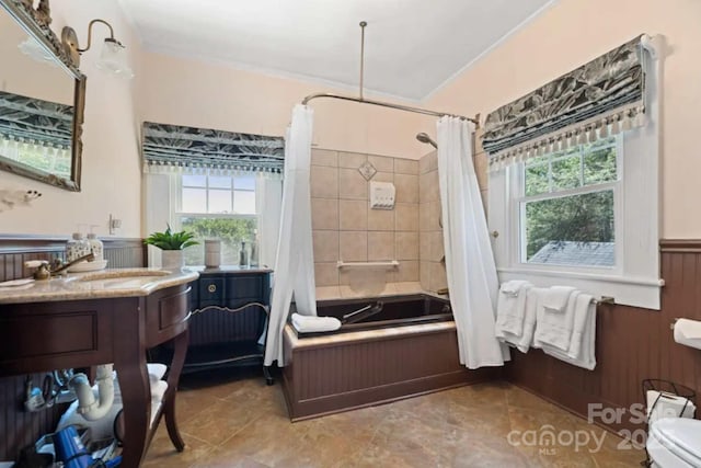 88 S Main St, Weaverville, NC 28787 - full bath with a healthy amount of sunlight, shower / bath combo with shower curtain, wainscoting, and vanity