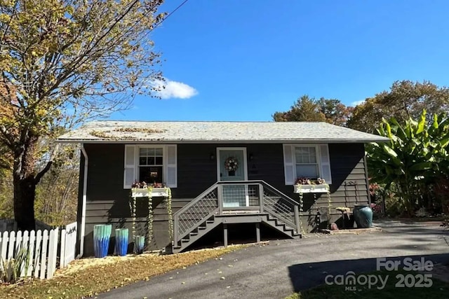 88 S Main St, Weaverville, NC 28787 - view of front of house featuring stairway, fence, and covered porch