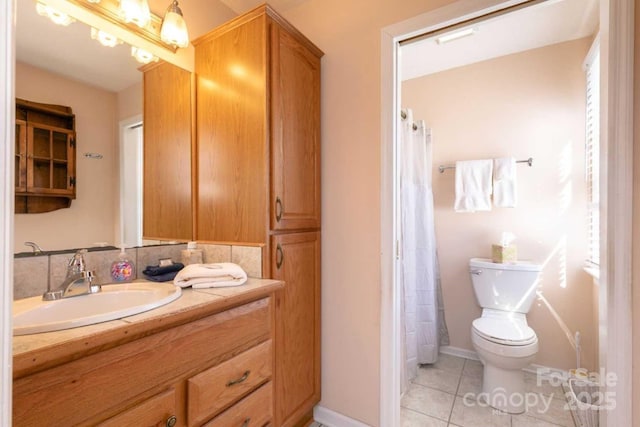 88 S Main St, Weaverville, NC 28787 - full bath with vanity, toilet, a shower with shower curtain, tile patterned floors, and baseboards