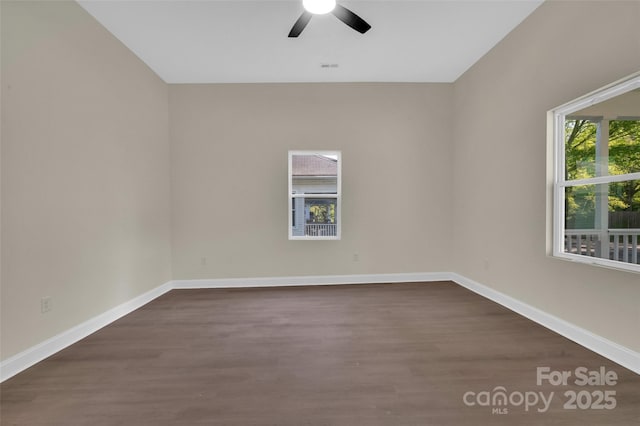 126 Hemphill Ave, Chester, SC 29706 - empty room with a ceiling fan, baseboards, and dark wood-style floors