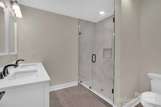 126 Hemphill Ave, Chester, SC 29706 - full bathroom featuring toilet, baseboards, a stall shower, double vanity, and recessed lighting