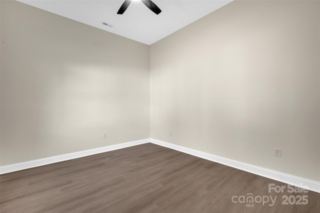 126 Hemphill Ave, Chester, SC 29706 - unfurnished room featuring a ceiling fan, dark wood-style floors, baseboards, and vaulted ceiling