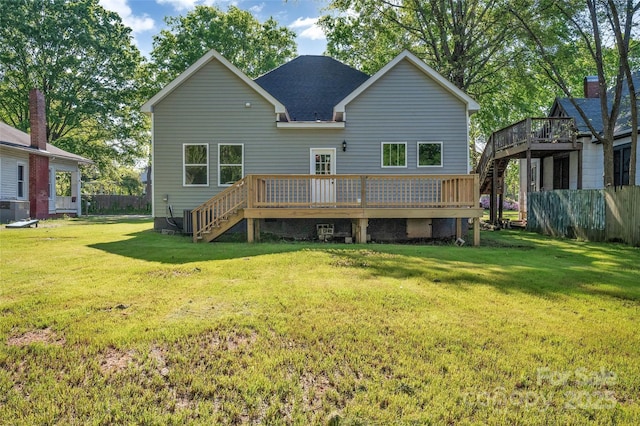 126 Hemphill Ave, Chester, SC 29706 - rear view of house featuring a wooden deck, a yard, and a shingled roof