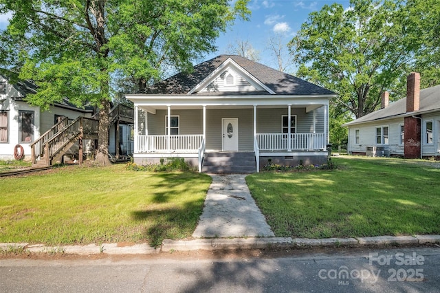 126 Hemphill Ave, Chester, SC 29706 - view of front of property featuring crawl space, covered porch, a front yard, and cooling unit