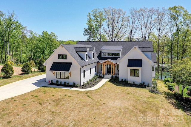 153 High Hills Dr, Mooresville, NC 28117 - modern farmhouse with a front lawn, roof with shingles, stucco siding, and driveway