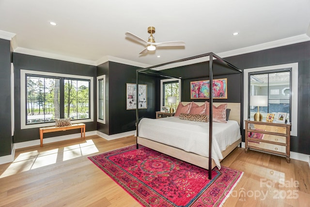153 High Hills Dr, Mooresville, NC 28117 - bedroom with crown molding, multiple windows, wood finished floors, and recessed lighting