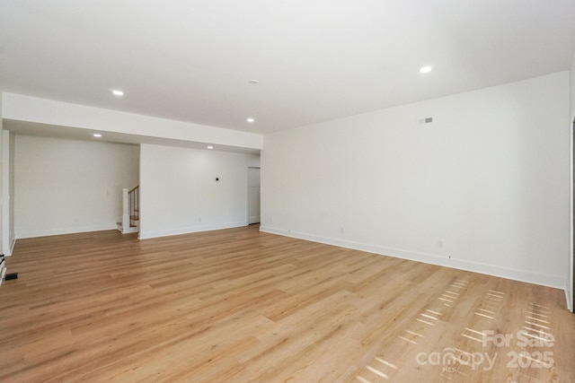 153 High Hills Dr, Mooresville, NC 28117 - unfurnished room with stairway, recessed lighting, and light wood finished floors