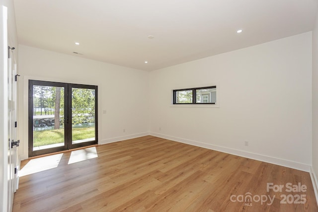 153 High Hills Dr, Mooresville, NC 28117 - unfurnished room with light wood-type flooring and recessed lighting