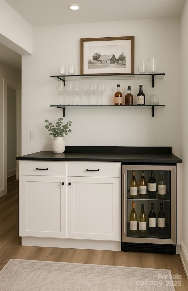 153 High Hills Dr, Mooresville, NC 28117 - indoor dry bar with light wood-style floors, recessed lighting, and refrigerator