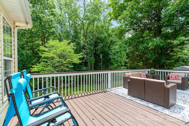 deck with an outdoor hangout area