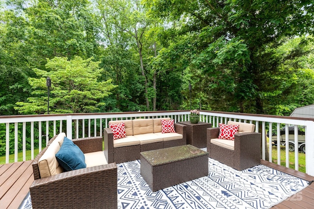 wooden deck with an outdoor living space