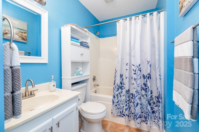 bathroom featuring toilet, vanity, and shower / bath combination with curtain