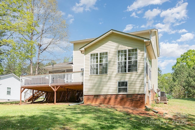 back of house featuring a deck, stairs, a lawn, and crawl space
