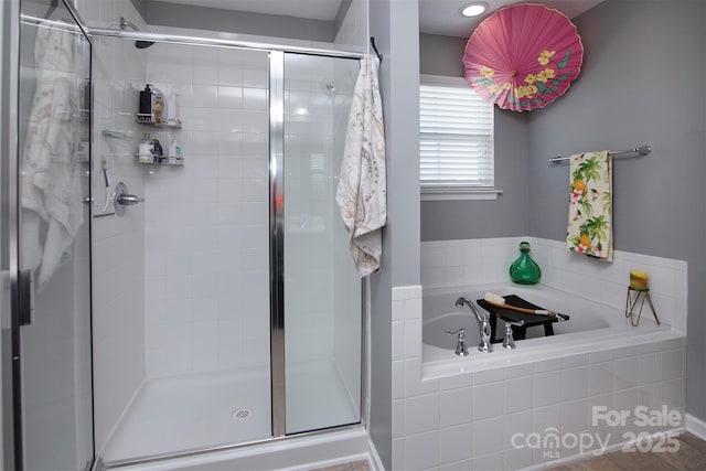 7397 Mill Ruins Ave SW, Concord, NC 28025 - full bath with a stall shower and a garden tub