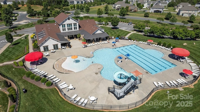 7397 Mill Ruins Ave SW, Concord, NC 28025 - aerial perspective of suburban area with a pool area