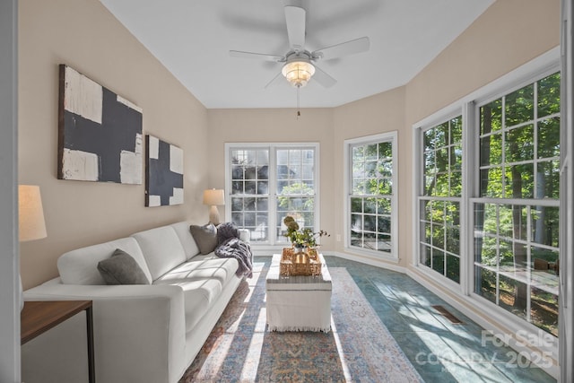 263 Fernbrook Dr, Mooresville, NC 28117 - living area with healthy amount of natural light and ceiling fan