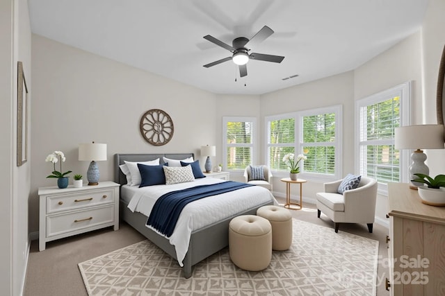 263 Fernbrook Dr, Mooresville, NC 28117 - bedroom featuring multiple windows, ceiling fan, and baseboards
