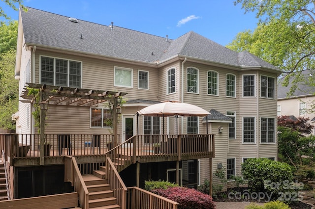 263 Fernbrook Dr, Mooresville, NC 28117 - rear view of house featuring a pergola, stairway, a deck, and a shingled roof