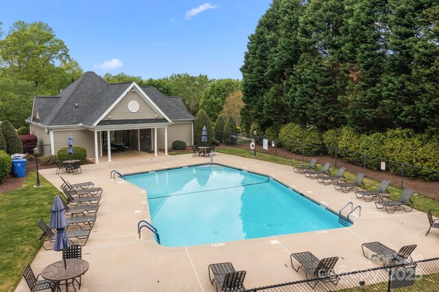 263 Fernbrook Dr, Mooresville, NC 28117 - community pool featuring fence and a patio