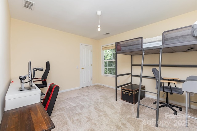 bedroom featuring carpet flooring and baseboards