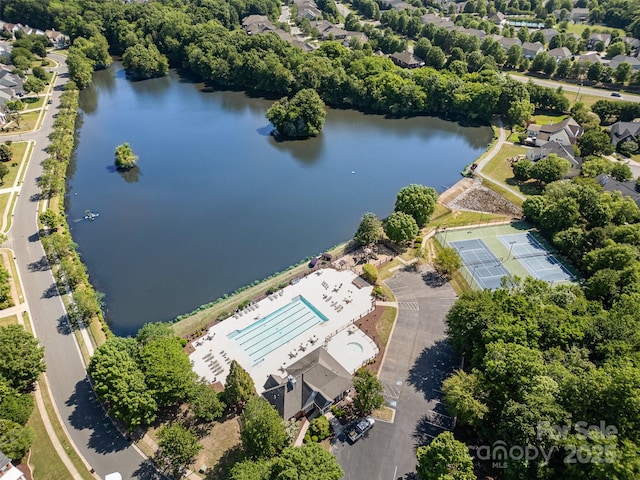 aerial view of a nearby body of water and a pool area