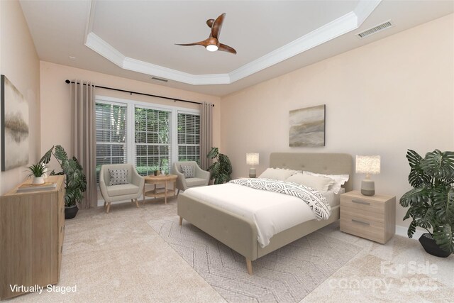 bedroom featuring carpet flooring, crown molding, a raised ceiling, and ceiling fan