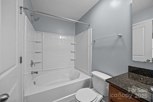 full bathroom with toilet, vanity, and shower / washtub combination