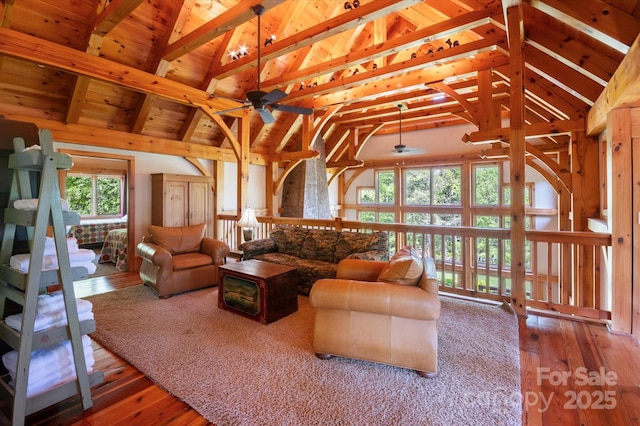 54 Cottage Grove Dr, Nebo, NC 28761 - living room featuring wood-type flooring, ceiling fan, wooden ceiling, and vaulted ceiling with beams