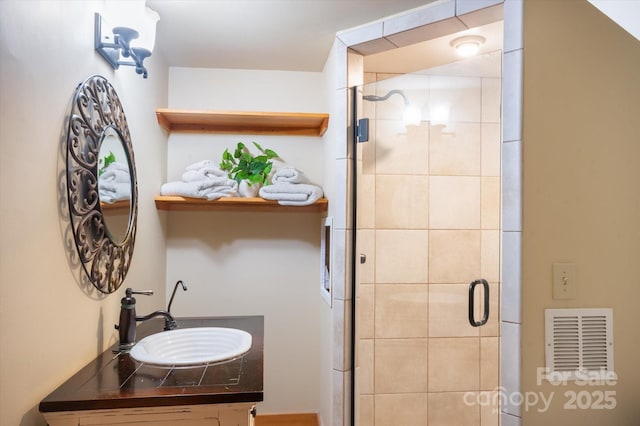 54 Cottage Grove Dr, Nebo, NC 28761 - full bathroom featuring visible vents, a shower stall, and vanity