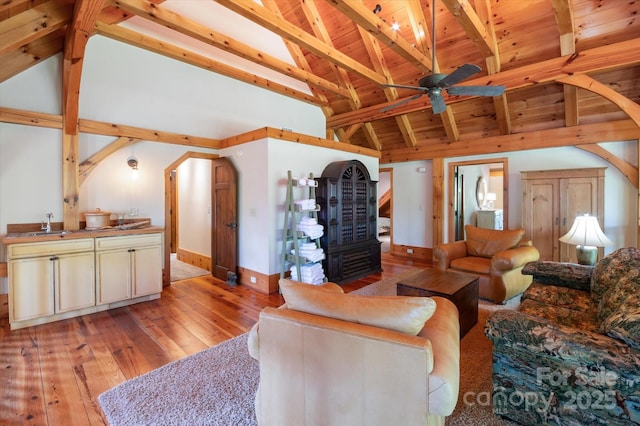 54 Cottage Grove Dr, Nebo, NC 28761 - living area featuring wood ceiling, ceiling fan, beam ceiling, high vaulted ceiling, and light wood-style flooring